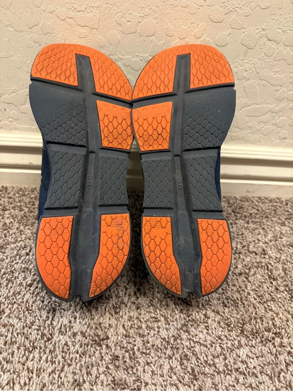 On Running Men’s Navy and Black Cloudtec Trainer with Orange Accents